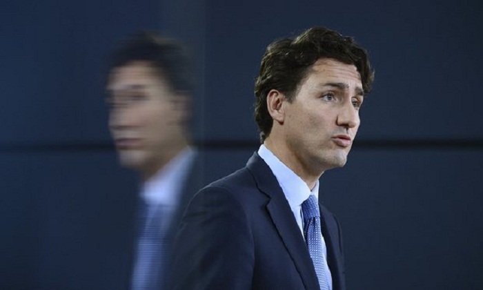 Trudeau continues self-isolating after his wife